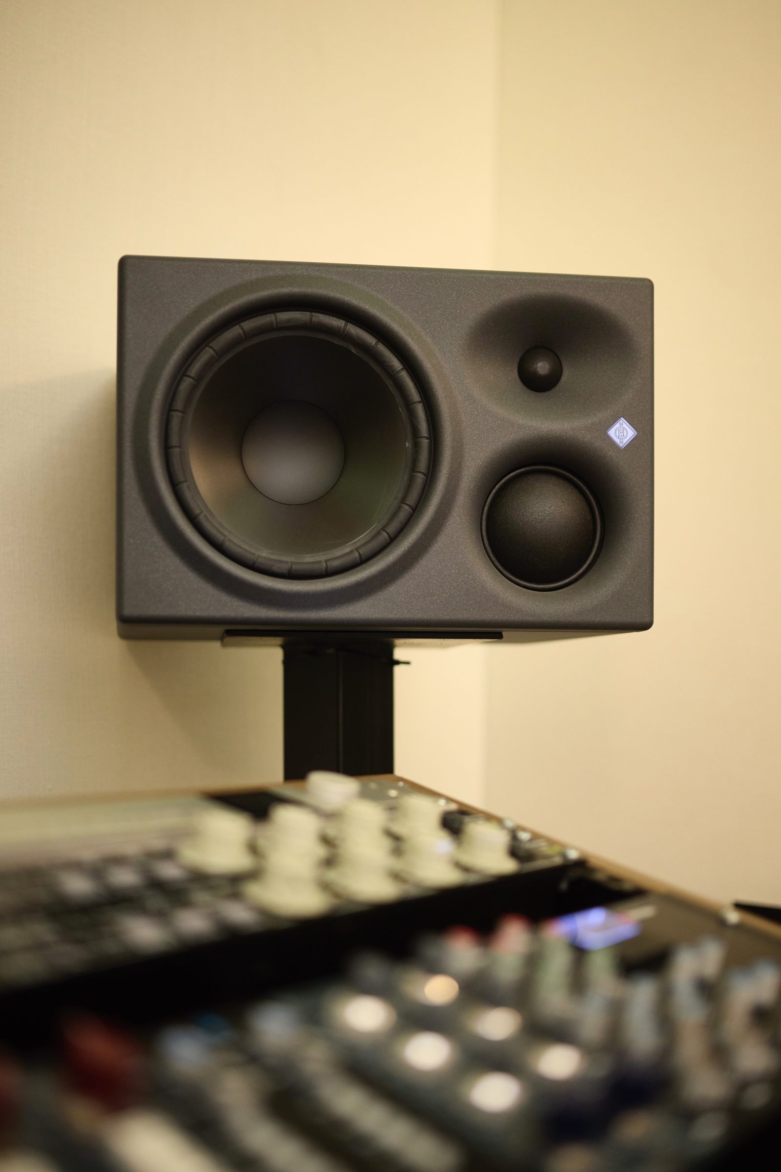 Neumann monitor mounted above the console